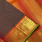 Manthulir green and kesari orange handwoven pure silk Kancheepuram saree with bawanchi borders, view 1