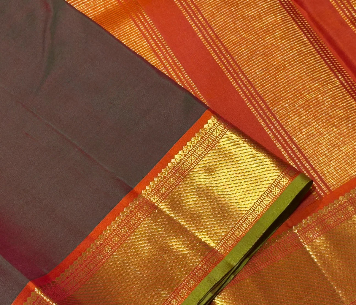 Manthulir green and kesari orange handwoven pure silk Kancheepuram saree with bawanchi borders, view 1