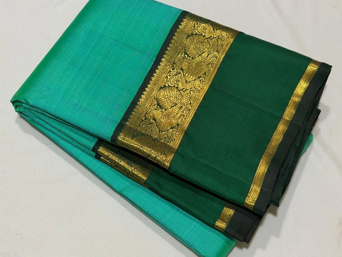 Light Green Handwoven Korvai Kanjivaram Silk Saree with Bottle Green Border