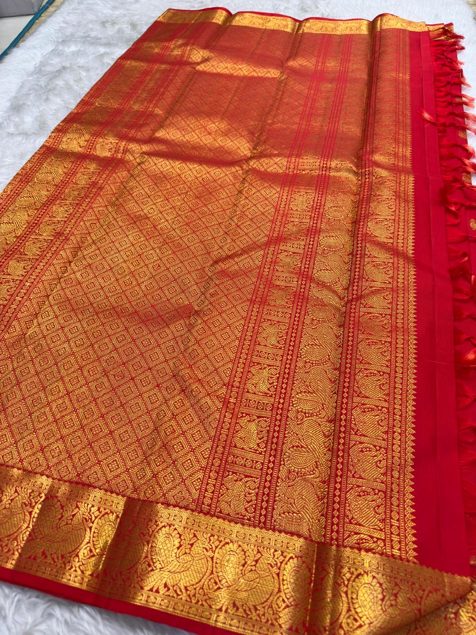 Silk Mark certified Kanjivaram saree with antique gold mayil border in red