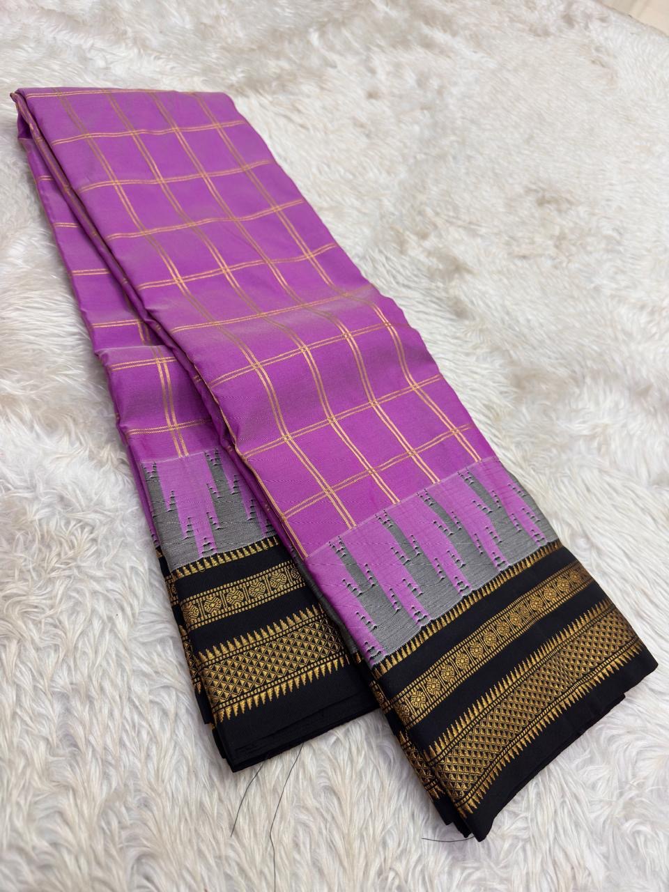 Traditional Arani silk saree with luminous silk texture and zari checks