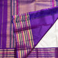 Silk-thread Mayil Chakram motifs on an ivory white Kanchipuram Varisaipet saree.