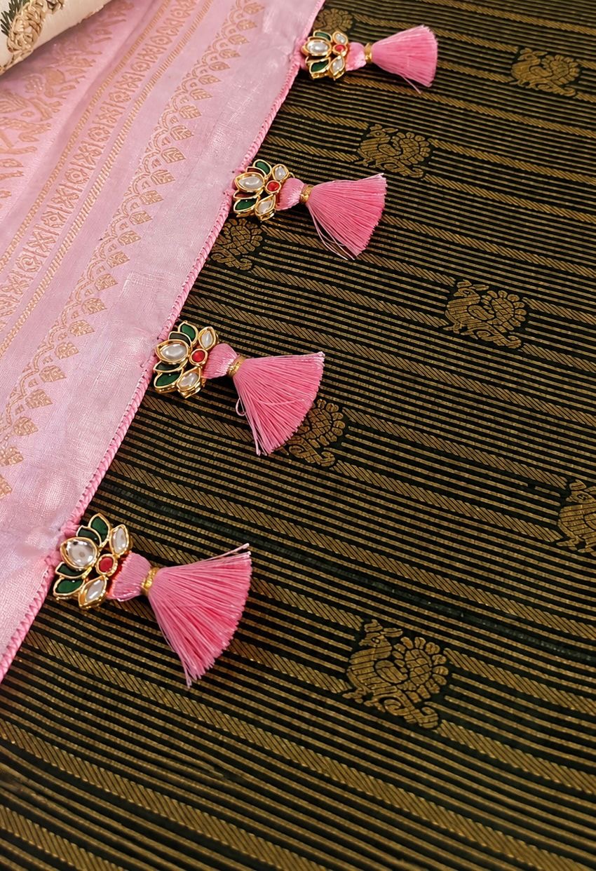 Close view of handmade silk thread saree tassels