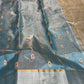 Full view of steel blue handloom Chanderi saree with gold motifs, red accents and intricately woven metallic pallu