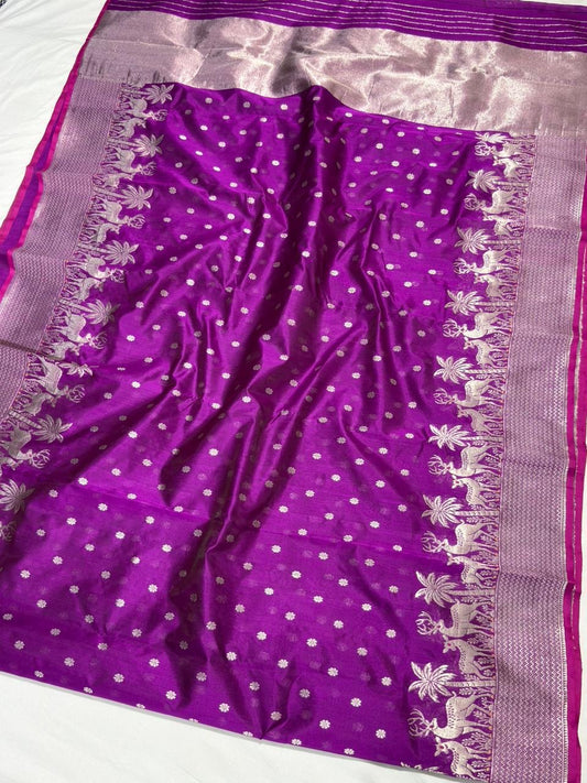 Close-up of the silver-woven deer and palm border on the Royal Purple Chanderi saree