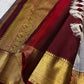 Broad gold zari Korvai border with deep Arakku Red finishing edge.