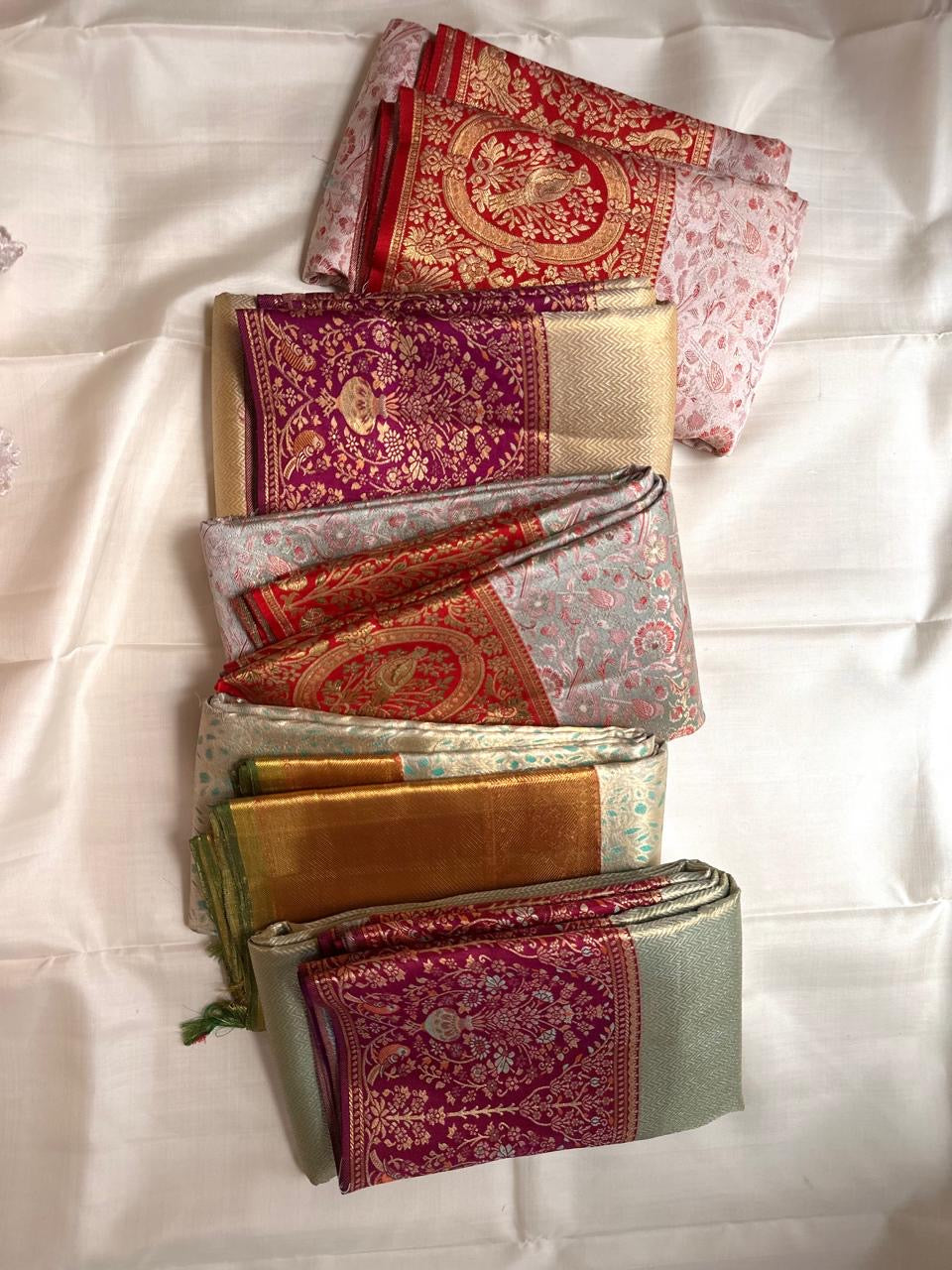 Silver Grey pure silk KanchiPattu Butta saree with Arakku Red Banarasi-style floral jaal zari border.