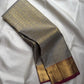 Silver Grey pure silk Kanjeevaram Korvai saree with broad gold zari border.
