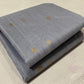 Pallu of silver grey Katan Silk Chanderi saree with large gold floral and paisley-inspired motifs