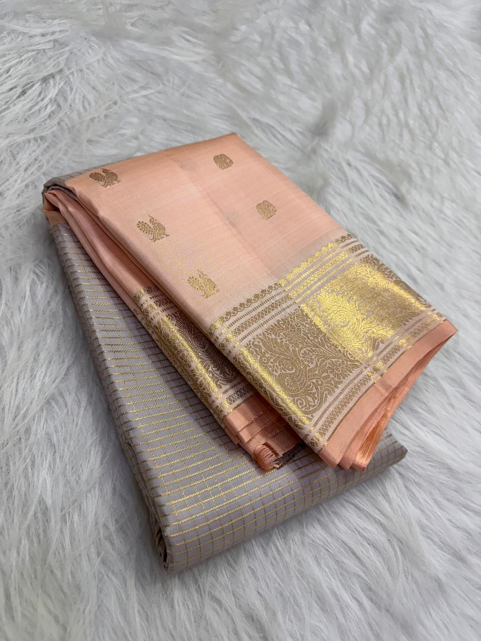 Close view of fine woven grid across Silver Grey pure silk Kanjivaram body.