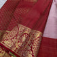 Silver Grey and Arakku Red Kanchipuram fusion saree with extensive Banarasi-style ornamental zariwork.
