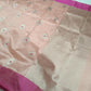 Blush Peach Chanderi silk saree pallu showing the broad silver-toned woven field with fine geometric texture