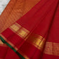 Narrow green selvedge detail framing the red edge of Pure Silk Kanjipuram saree