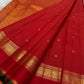 Sindoor red Pure Silk Kanjipuram Zari Kattam saree with fine gold lattice and narrow green selvedge