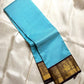 Kanchipattu silk saree in sky blue with cocoa brown border Kanchi Kattam Korvai weave traditional zari detail