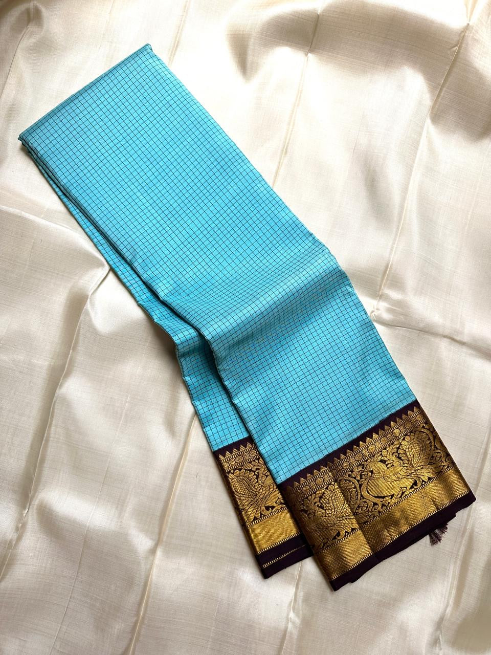 Kanchipattu silk saree in sky blue with cocoa brown border Kanchi Kattam Korvai weave traditional zari detail