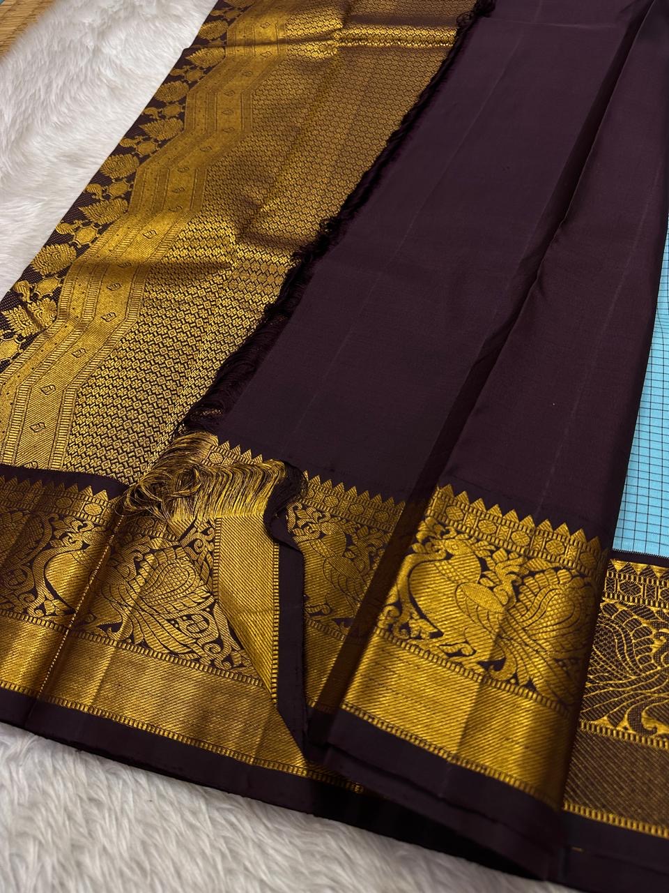 Kanchipattu silk saree in sky blue with cocoa brown border Kanchi Kattam Korvai weave traditional zari detail