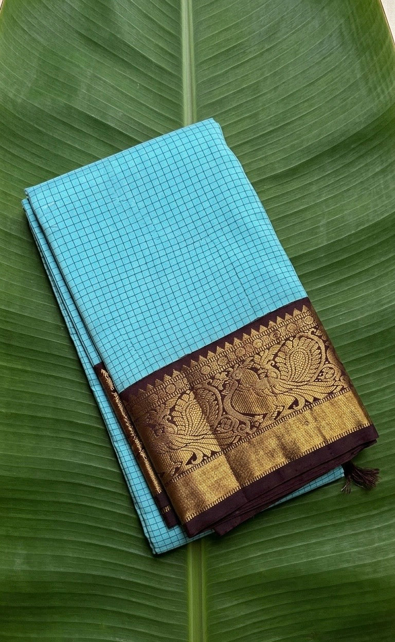 Kanchipuram silk saree in sky blue with cocoa brown border Kanchi Kattam Korvai weave folded view