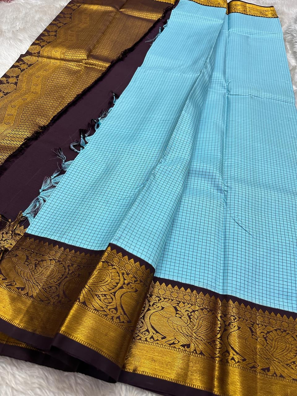 Kanchipattu silk saree in sky blue with cocoa brown border Kanchi Kattam Korvai weave traditional zari detail