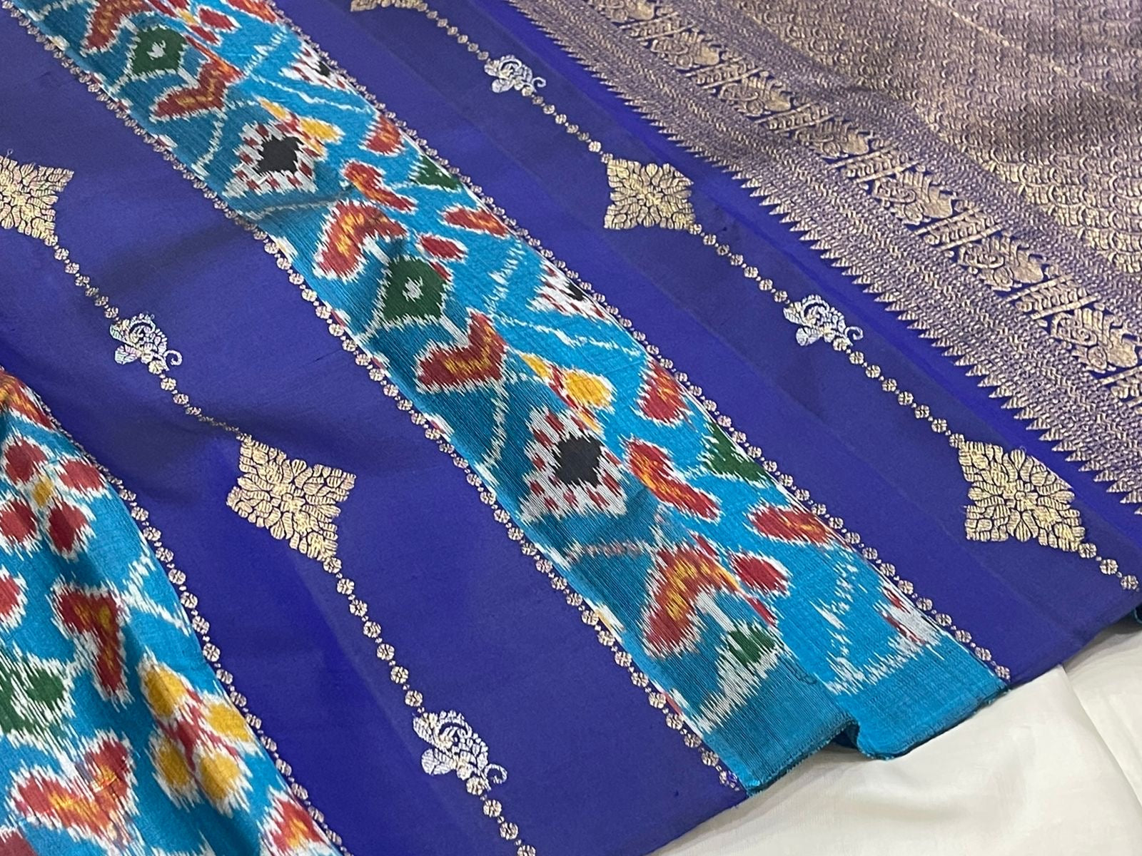 Sky blue Kanchipattu saree with Pochampally ikat fusion and hexagonal silk thread butta — Idam Living