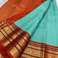 Sky blue Kanjeevaram saree with Varisaipet weave and rust orange ornate zari border — Idam Living