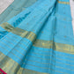 Sky Blue pure mulberry silk Varisaipet saree with gold zari lines and Rani Pink selvedge.