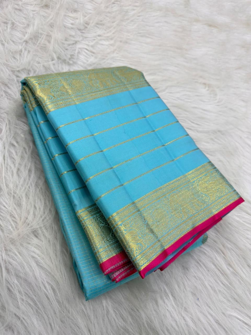 Sky Blue pure silk Kanjivaram Varisaipet saree with layered antique-gold traditional zari border.