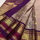 Deep Purple and raspberry Varisaipet border with large gold Mayil motifs on pure Kanjipuram silk.