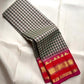 Full view of a Soft Ivory checked pure silk Kanjeevaram saree with raspberry-red border and gold zari.