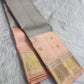 Soft Peach Pink Kanjivaram border with large antique-gold paisley motifs.