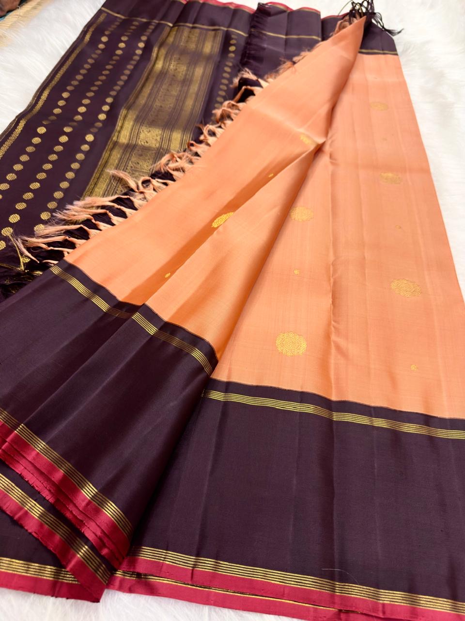 Soft Peach Pink Handwoven Pure Silk Kanchi Pattu Saree with Deep Aubergine Rettapet Border and Zari Buttas