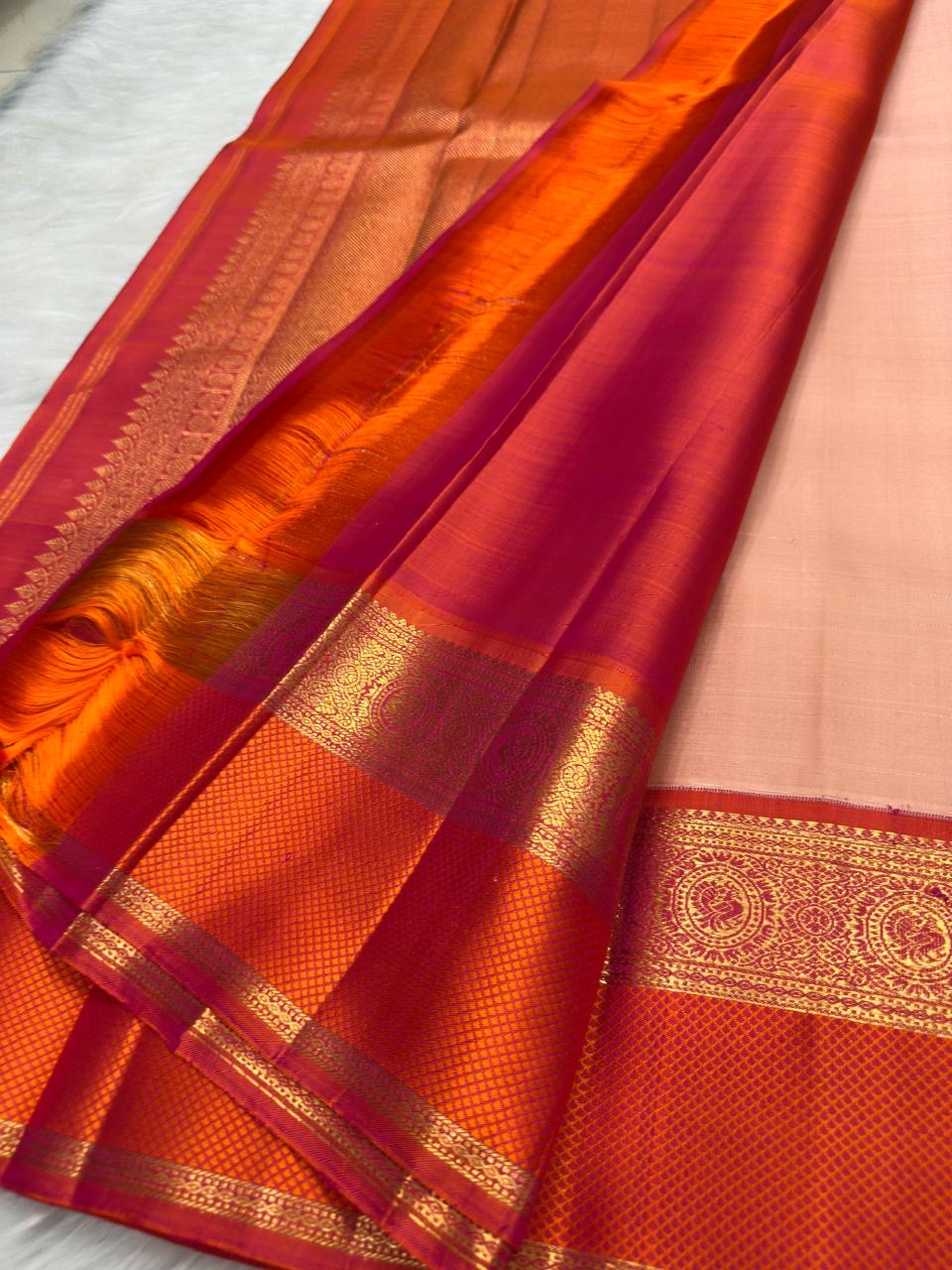 Soft peach pink pure silk Kanjipuram Korvai saree, full drape