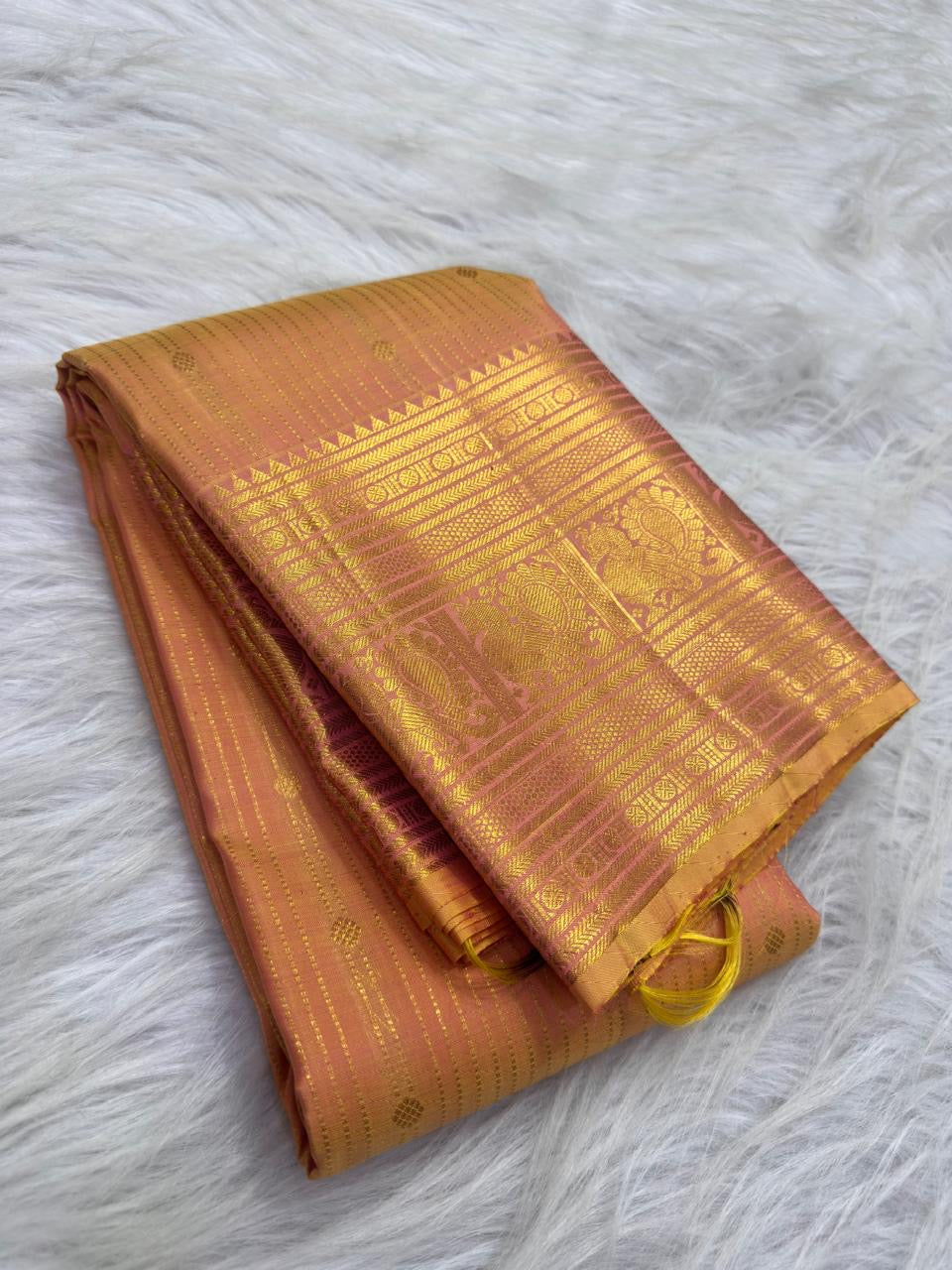 Soft Peach Pink Pure Silk Kanchipuram saree with fine gold zari detailing