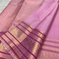 Soft Lotus Pink Kanjivaram silk with layered silk-thread zari border.