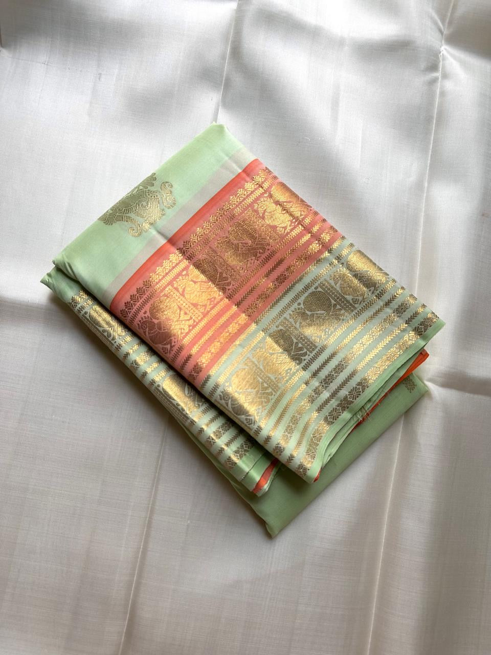 Soft Pistachio Green KanchiPattu silk saree draped, full length view — Idam Living
