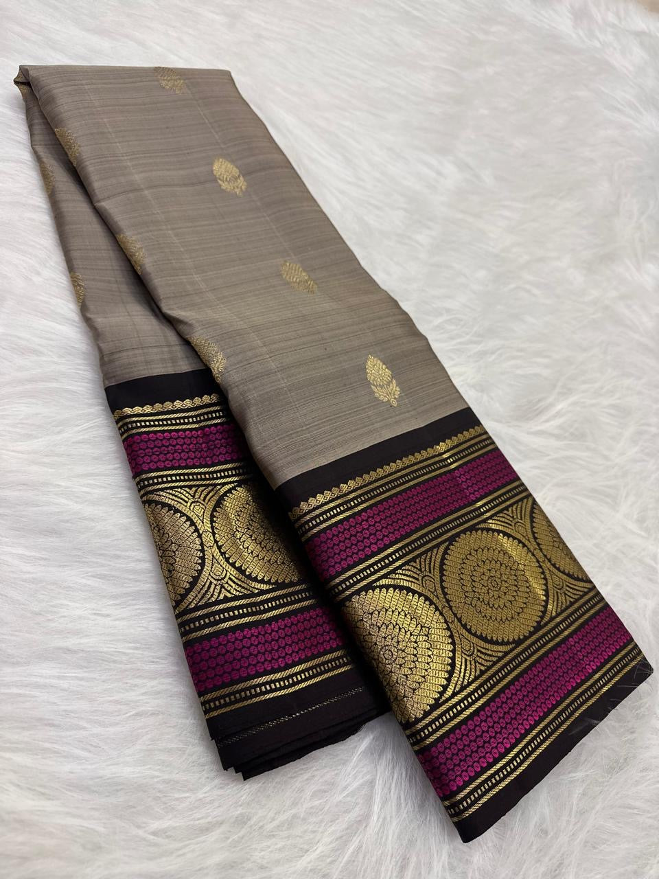 Soft Taupe Grey Kanjipuram Saree — body close-up showing scattered gold zari buttas