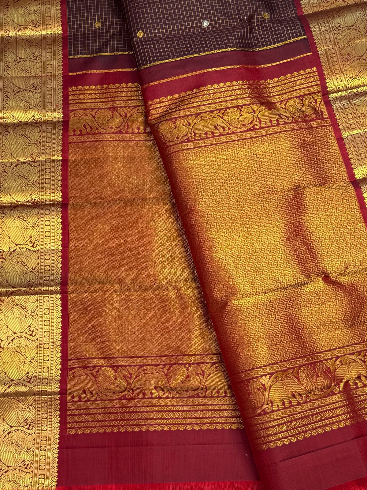 Petite gold and silver Sona Rupa buttas on a Zari Kattam Kanjivaram silk body