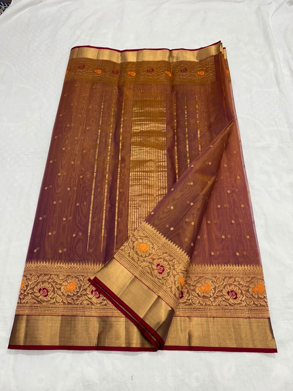 Copper Brown Floral Zari Katan Silk Chanderi Saree, golden buti motifs on the copper-brown body