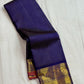 Deep blue Kanjivaram with muted copper-orange border edge