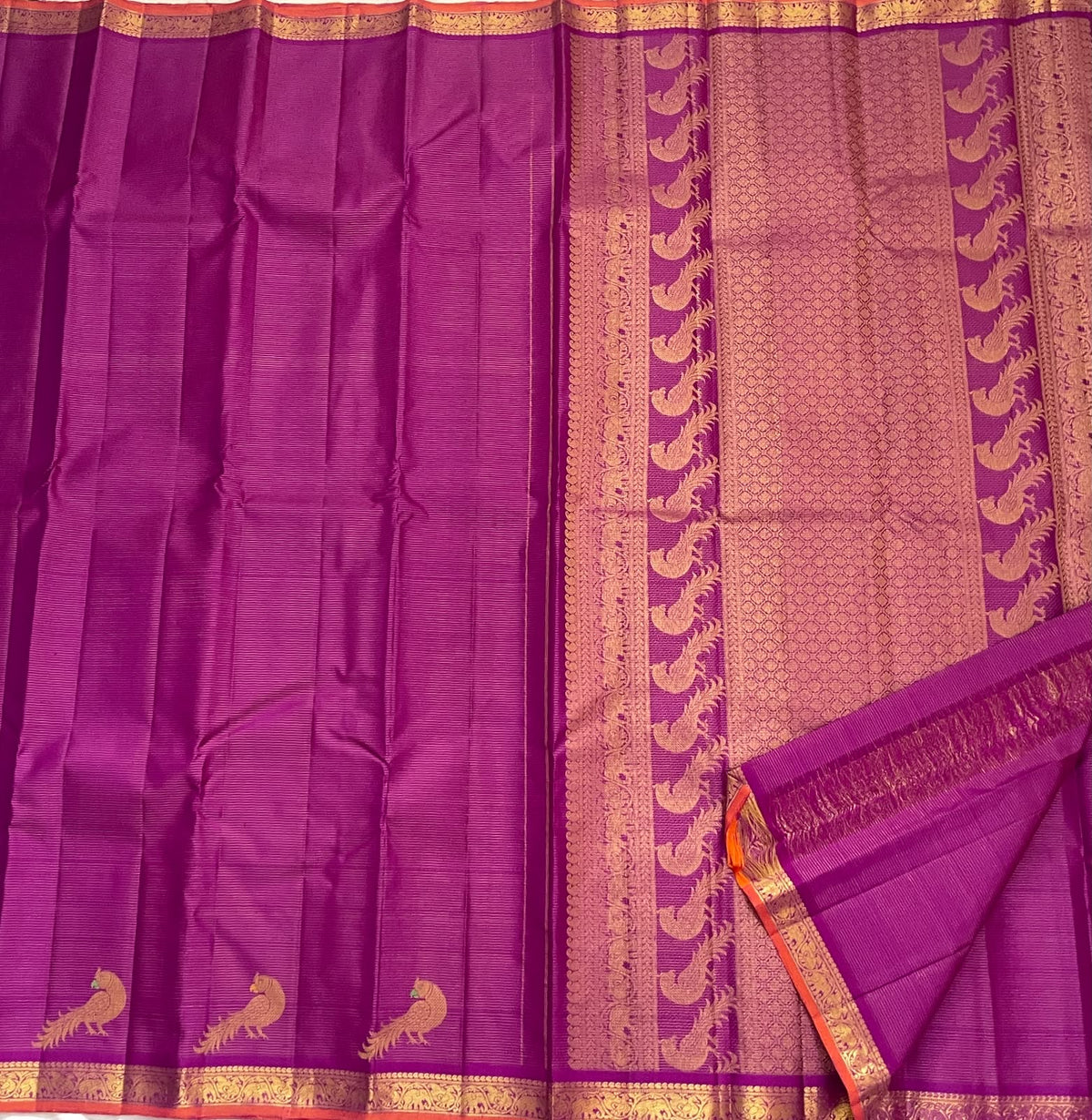 Vadamalli purple Vairaoosi Kanjeevaram silk saree with bright kesari orange edging, folded view — Idam Living