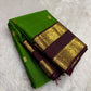 Vibrant parrot green Kanjivaram silk saree with coffee brown rettapet border traditional zari Idam Living
