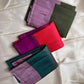 stacked folded silk sarees showing lavender and green contrast available in the USA