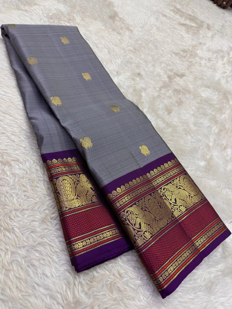 Steel Grey and Kanchana Purple Handwoven Pure Silk Kanchipuram Saree with Mayil Butta and Vanasringaram Yaanai Border