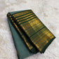 Close view of Varisaipet body showing Floral Butta in gold zari on sage green silk