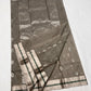 Full view of Stone Grey handloom Chanderi saree showing silver motifs and broad border with twin Emerald Green lines.