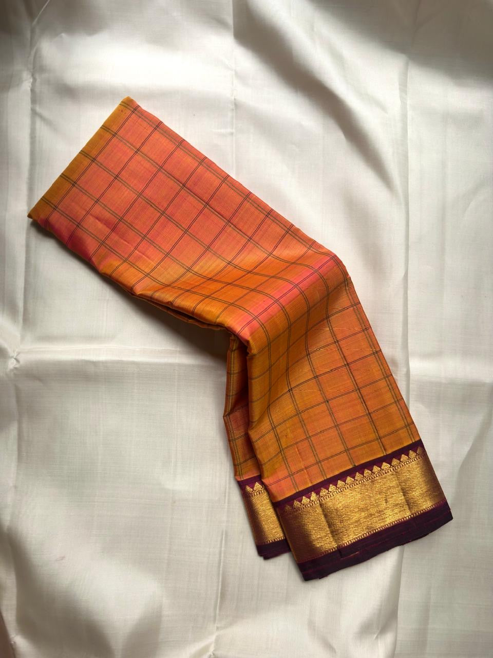 Sunset orange double shade shot colour handwoven pure silk Kanchipuram korvai kattam saree