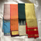 Kancheepuram pure silk kattam saree in sunset orange with purple contrast, handwoven in Kunnam village