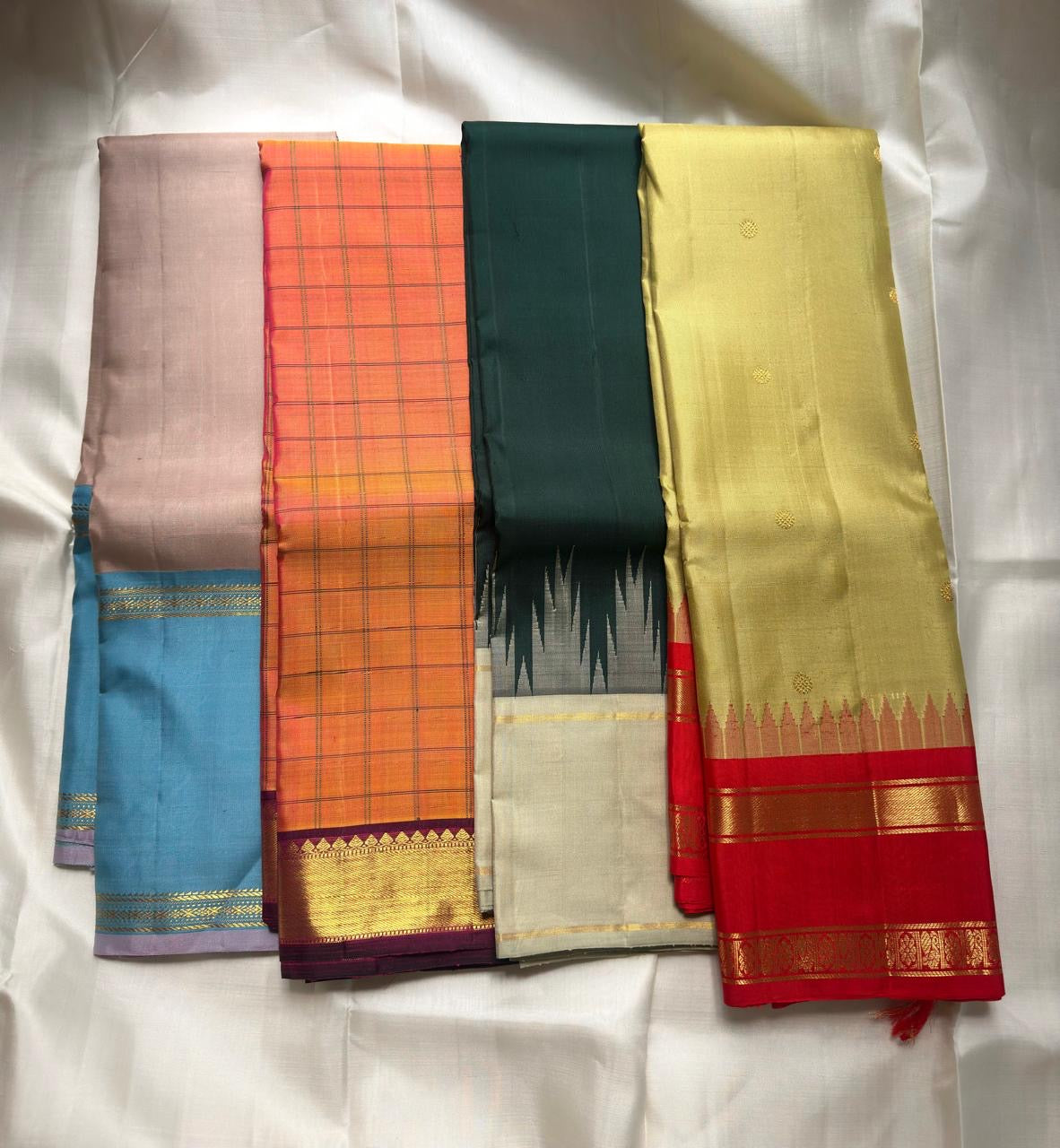 Kancheepuram pure silk kattam saree in sunset orange with purple contrast, handwoven in Kunnam village