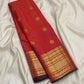 Double-shot coral and sunset orange Pure Silk Kanchipuram Zari Kattam saree with Varisaipet border, Rudraksham detail, and grand pallu.