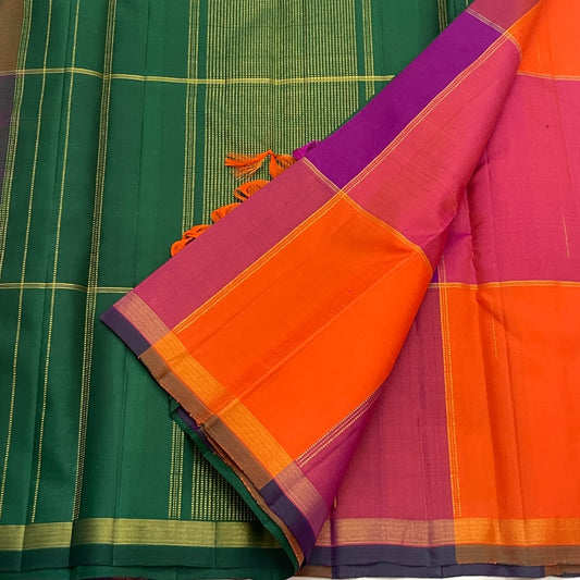 Sunset orange and pink handwoven Kanjivaram saree with forest green pallu, full view